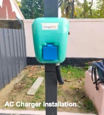 Compact AC charger installation on a dedicated post